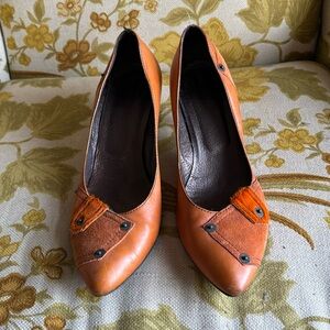 Miss Sixty low orange leather heels.